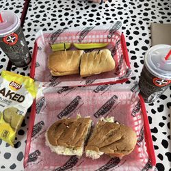 Firehouse Subs - Medium Smoked Turkey Breast and medium New York Steamer subs with Coke Zero