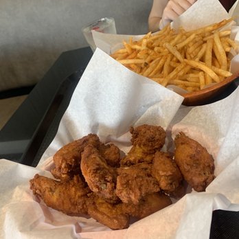 Firestone Grill - Spicy wings and basket of fries - Barbeque Near Me - Bakersfield, California Firestone Grill - Spicy wings and basket of fries - Barbeque Near Me - Bakersfield, California