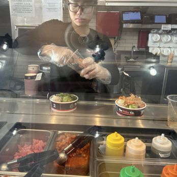 The Poke Co. - Long Beach - Mixing in a plastic cup & stick?! - Poke Near Me - Long Beach, California