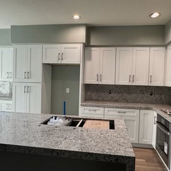 Element Construction and Restoration - After new cabinets, new countertops and new island installed. - Damage Restoration Near Me Element Construction and Restoration - After new cabinets, new countertops and new island installed. - Damage Restoration Near Me