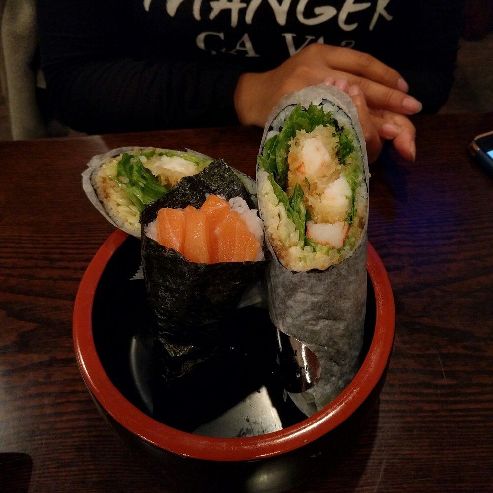Sakura Sushi - The shrimp tempura sushi burrito and a salmon hand roll. No need for chopsticks here. - Japanese Near Me - Manalapan Township, New Jersey Sakura Sushi - The shrimp tempura sushi burrito and a salmon hand roll. No need for chopsticks here. - Japanese Near Me - Manalapan Township, New Jersey