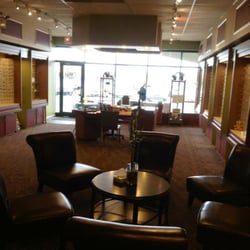 Affinity Optical - Cozy waiting area with a section of toys for children to entertain themselves with.