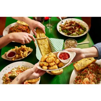 Oregano's - a table full of food - Pizza Near Me - Tucson, Arizona Oregano's - a table full of food - Pizza Near Me - Tucson, Arizona