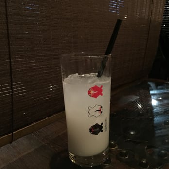 Kingyo - a lot like an Italian soda. carbonated water and the bottom has a sweet and rich flavor. Glass= gorgeous  and highly detailed design - Japanese Near Me - Vancouver, British Columbia