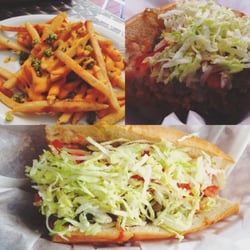 Big Mike's Philly Steaks & Subs - Garlic cheese fries and a buffalo chicken Philly sub (fixed with lettuce, tomato, spicy peppers, and sweet peppers).
