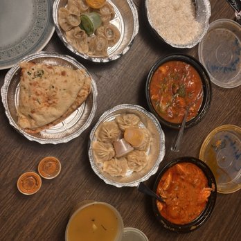 Sikkim Hut - S75. Garlic Naan, S61. Beef and Chives Beef Momo, Chicken Manchurian, S83. Chicken Butter Masala, S58. Chicken Momo, S99. Plain Rice - Himalayan/Nepalese Near Me - Thornwood, New York Sikkim Hut - S75. Garlic Naan, S61. Beef and Chives Beef Momo, Chicken Manchurian, S83. Chicken Butter Masala, S58. Chicken Momo, S99. Plain Rice - Himalayan/Nepalese Near Me - Thornwood, New York