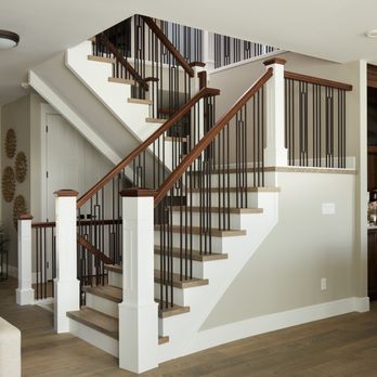 Specialized Stair & Rail - Closed rise eastern flare staircase with iron and wood railing. - Decks & Railing Near Me - Kelowna, British Columbia Specialized Stair & Rail - Closed rise eastern flare staircase with iron and wood railing. - Decks & Railing Near Me - Kelowna, British Columbia