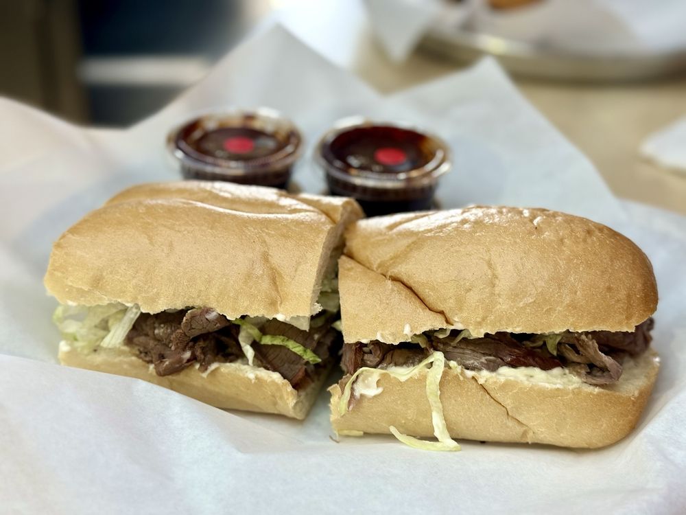 Kinder's Meats Deli BBQ Logo