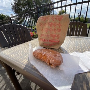 Paula's Donuts - Eating this jumbo cheese donut on the patio in the September sunshine - Donuts Near Me - Tonawanda, New York