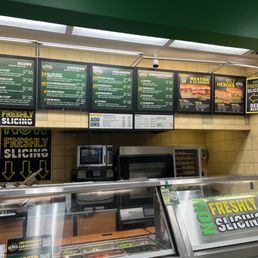 menus on the wall of a subway restaurant menus on the wall of a subway restaurant