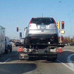 Dixon Auto Sales - On its way to the junk yard.