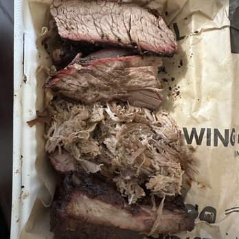 Dickey's Barbecue Pit - Supposed to be pork and beef burnt ends and ribs.... Clearly that's pulled pork, sliced brisket and dry ass ribs - Barbeque Near Me - Pecos, Texas
