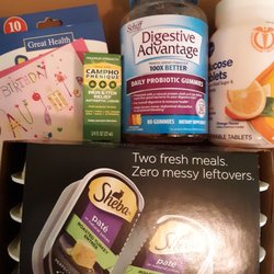 Kroger - The Jamaican pharmacist working there refused to ring up 6 small additional items after 20 min wait for Rx