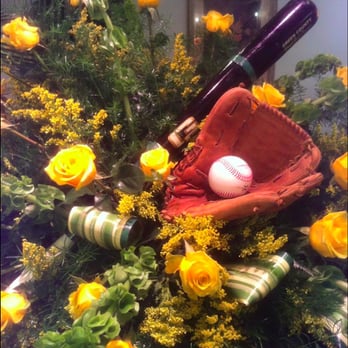 Jack's Florist It's a Dandy - Personally designed floral arrangement utilizing recipients love of baseball! - Florists Near Me Jack's Florist It's a Dandy - Personally designed floral arrangement utilizing recipients love of baseball! - Florists Near Me