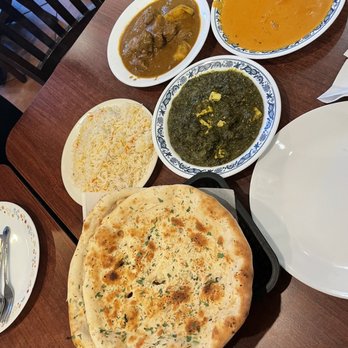 Naan n Curry - From left to right: Garlic Naan, Plain Rice, Palak Paneer, Lamb Vindaloo, Chicken Tikka Masala - Indian Near Me - Concord, California Naan n Curry - From left to right: Garlic Naan, Plain Rice, Palak Paneer, Lamb Vindaloo, Chicken Tikka Masala - Indian Near Me - Concord, California