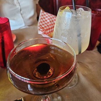 Osteria - Manhattan in the foreground and a Belini in the background. - Italian Near Me - Oklahoma City, Oklahoma
