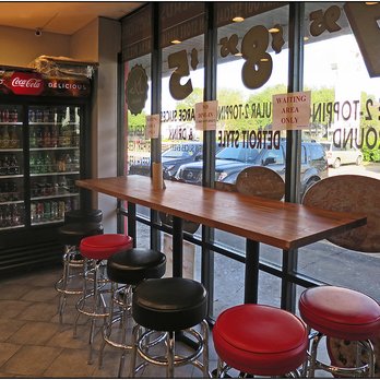 Space City Pizza - This seating is only customers waiting for their pizza. - Pizza Near Me - Webster, Texas Space City Pizza - This seating is only customers waiting for their pizza. - Pizza Near Me - Webster, Texas