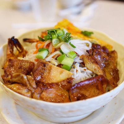 Photo of Thuan Kieu Noodle & Grill - Irvine, CA, United States. Vermicelli bowl with grilled chicken, BBQ shrimp and egg quiche. Huge and delicious.