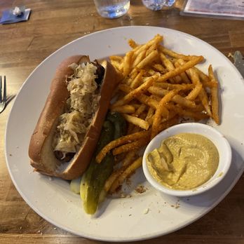 Bavaria Pensacola - I am halfway through the meal as I snap this pic.... There were originally two brats on the plate and twice as many fries. - German Near Me - Pensacola, Florida Bavaria Pensacola - I am halfway through the meal as I snap this pic.... There were originally two brats on the plate and twice as many fries. - German Near Me - Pensacola, Florida