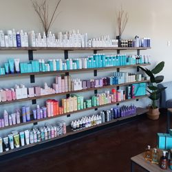 Kalon Salon and Spa - Inviting waiting area, full of products. Clean and organized!