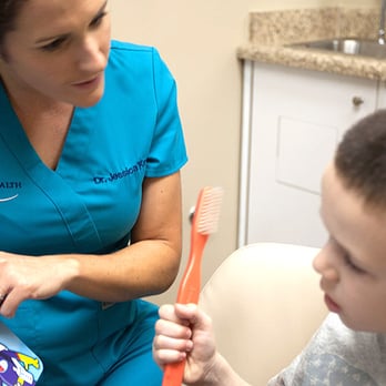 Commonwealth Smiles - Dr. Kress with patient - General Dentistry Near Me - Lexington, Kentucky Commonwealth Smiles - Dr. Kress with patient - General Dentistry Near Me - Lexington, Kentucky