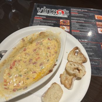 Vinzo's - Vinzo's Dip. Half eaten because I couldn't help myself!!! - Pizza Near Me - Casselberry, Florida Vinzo's - Vinzo's Dip. Half eaten because I couldn't help myself!!! - Pizza Near Me - Casselberry, Florida