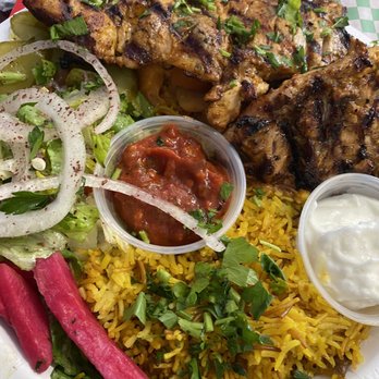 Pita Pockets - Yellow Rice, grilled chicken, salads and garlic sauce on the side - Middle Eastern Near Me - Hollywood, Florida Pita Pockets - Yellow Rice, grilled chicken, salads and garlic sauce on the side - Middle Eastern Near Me - Hollywood, Florida