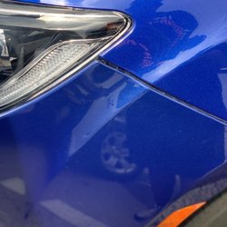 Budget Airport Parking - Damaged fender before rental