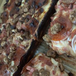 BURNT crust/cheese on the edges...