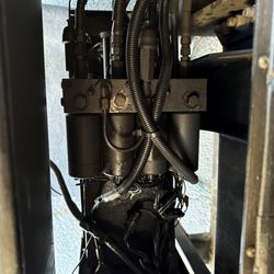 All American RV Repair - HWH system under the entrance steps.