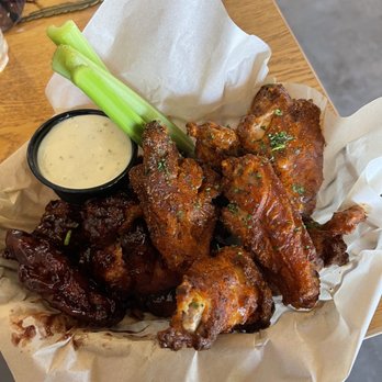 Wicked Rain - 12 piece wings. Half bbq, half buffalo. - Beer Bar Near Me - Gilbert, Arizona Wicked Rain - 12 piece wings. Half bbq, half buffalo. - Beer Bar Near Me - Gilbert, Arizona