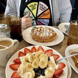 Greek yogurt with "red white and blue" fruit, amazing coffee, and the carrot cake Belgian waffle special