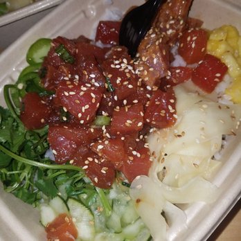 Poke Bistro - Large on white rice. 5 scoops. 4 scoops spicy tuna 1 reg tuna. Ginger. Cilantro. PINEAPPLE and cucumbers. Flawless - Seafood Near Me - Riverside, California