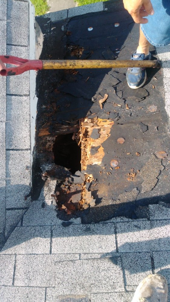 Slide of Emmanuel C.S.M.S Roofing