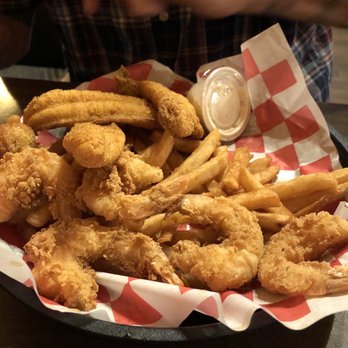 Horseshoe Grill - Shrimp and Catfish Basket full of French Fries and So Good Hush Puppies. - American Near Me - Eureka Springs, Arkansas Horseshoe Grill - Shrimp and Catfish Basket full of French Fries and So Good Hush Puppies. - American Near Me - Eureka Springs, Arkansas