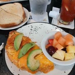 Vege omelette with fruit and toast Vege omelette with fruit and toast