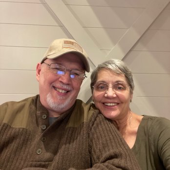 Chili's - a man and a woman sitting at a table - Bars Near Me - Athens, Texas