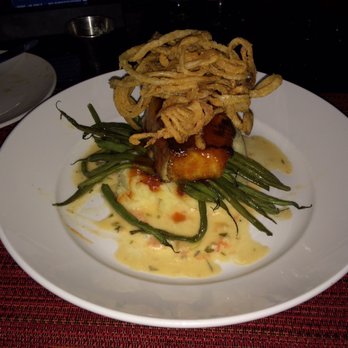 Mancy's Bluewater Grille - BBQ Glazed Sea Bass with leak mash, baby green beans, onion straws with a tomato shallot butter...Awesome. - Seafood Near Me - Maumee, Ohio Mancy's Bluewater Grille - BBQ Glazed Sea Bass with leak mash, baby green beans, onion straws with a tomato shallot butter...Awesome. - Seafood Near Me - Maumee, Ohio