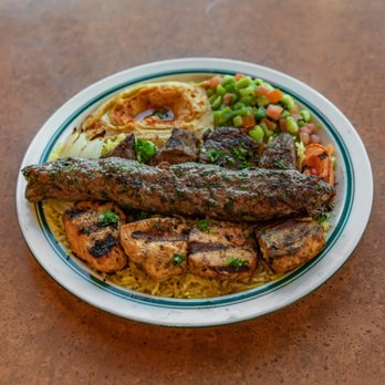 Kababji Grill - a plate of food on a table - Mediterranean Near Me - Round Rock, Texas Kababji Grill - a plate of food on a table - Mediterranean Near Me - Round Rock, Texas