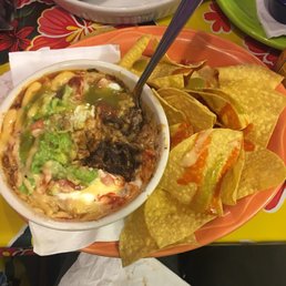 Beans a rice bowl with added pork tinga Beans a rice bowl with added pork tinga