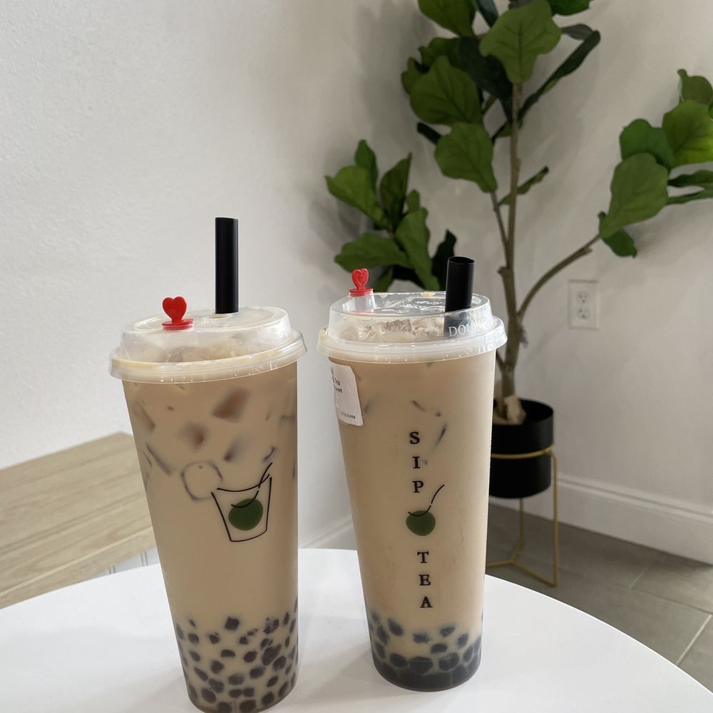Sip Tea Boba - Left: brown sugar milk tea with golden boba Right: Hokkaido milk tea with boba - Bubble Tea Near Me - Pinellas Park, Florida Sip Tea Boba - Left: brown sugar milk tea with golden boba Right: Hokkaido milk tea with boba - Bubble Tea Near Me - Pinellas Park, Florida