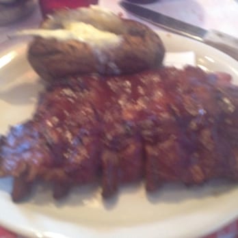 Cody's Original Roadhouse - Spring Hill - Half rack of ribs and baked potato - American Near Me - Spring Hill, Florida