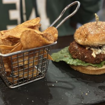 District GastroBar - Chicken sandwich (spicy) - Cocktail Bars Near Me - Orlando, Florida District GastroBar - Chicken sandwich (spicy) - Cocktail Bars Near Me - Orlando, Florida