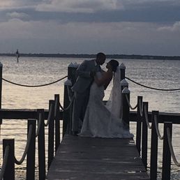Bride and groom on the pier Bride and groom on the pier