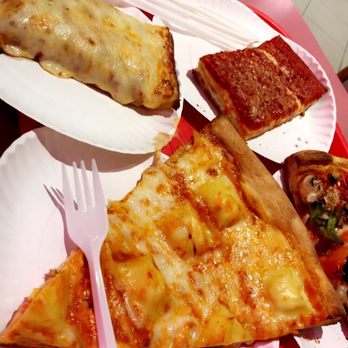 Rosa's Pizza - Ravioli on the bottom, sici on left, vegetable cameo on right and another tomato slice on top - Pizza Near Me - Maspeth, New York