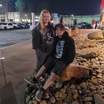 Texas Roadhouse - Chilling on the rocks while awaiting our table - Steakhouses Near Me - Gainesville, Georgia