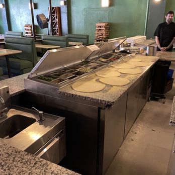 The Upper Crust - Staff makes the pizza right in the middle of the restaurant - Pizza Near Me - Gettysburg, Pennsylvania