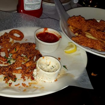 Yard House - Calamari (half eaten), chicken tenders - New American Near Me - Northridge, California Yard House - Calamari (half eaten), chicken tenders - New American Near Me - Northridge, California