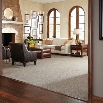 Custom Carpets Centers - a living room with arched windows - Carpeting Near Me - Tonawanda, New York Custom Carpets Centers - a living room with arched windows - Carpeting Near Me - Tonawanda, New York
