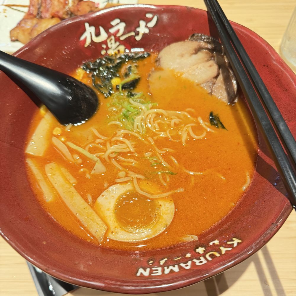 Kyuramen - Half eaten but this is how my mild spicy ramen soup looked like. - Ramen Near Me - Naperville, Illinois Kyuramen - Half eaten but this is how my mild spicy ramen soup looked like. - Ramen Near Me - Naperville, Illinois